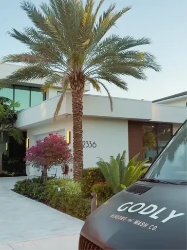 professional window cleaning team member